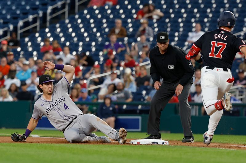 Aug 21, 2024; Washington, District of Columbia, USA; Colorado Rockies first baseman Michael Toglia (4) slides to tag first base after fielding a ground ball by Washington Nationals outfielder Alex Call (17) during the fourth inning at Nationals Park. Mandatory Credit: Geoff Burke-USA TODAY Sports