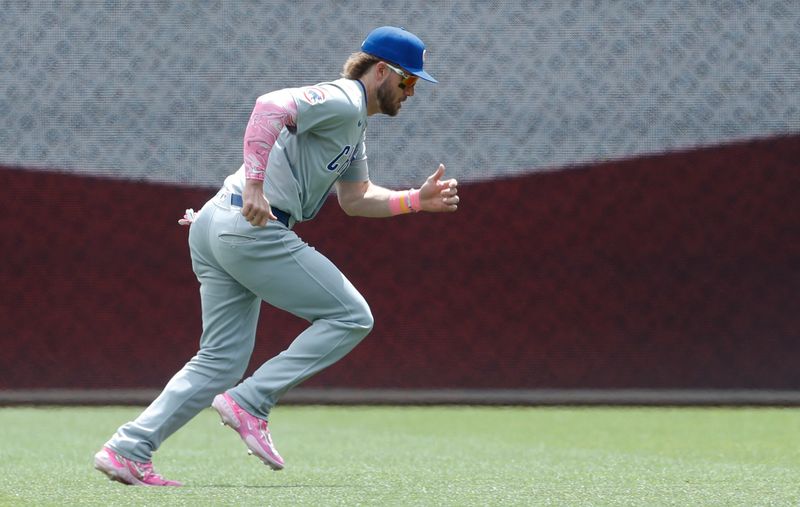 May 12, 2024; Pittsburgh, Pennsylvania, USA;  Chicago Cubs first baseman Patrick Wisdom (16) runs in the outfield before the game against the Pittsburgh Pirates at PNC Park. Mandatory Credit: Charles LeClaire-USA TODAY Sports