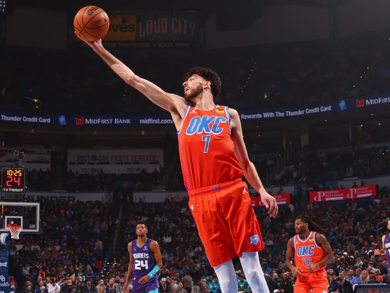 OKLAHOMA CITY, OK - FEBUARY 2:  Chet Holmgren #7 of the Oklahoma City Thunder grabs the rebound during the game on February 2, 2024 at Paycom Arena in Oklahoma City, Oklahoma. NOTE TO USER: User expressly acknowledges and agrees that, by downloading and or using this photograph, User is consenting to the terms and conditions of the Getty Images License Agreement. Mandatory Copyright Notice: Copyright 2024 NBAE (Photo by Zach Beeker/NBAE via Getty Images)