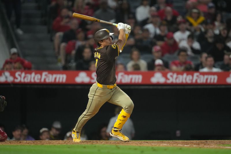 Jun 3, 2024; Anaheim, California, USA; San Diego Padres shortstop Ha-Seong Kim (7) hits a double in the seventh inning against the Los Angeles Angels at Angel Stadium. Mandatory Credit: Kirby Lee-USA TODAY Sports