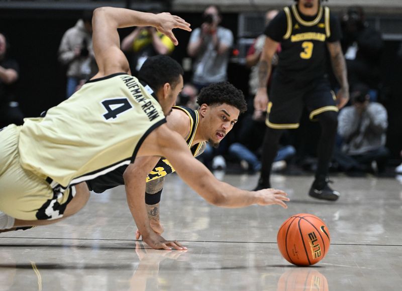 Feb 17, 2026; West Lafayette, Indiana, USA; Michigan Wolverines forward Yaxel Lendeborg (23) and Purdue Boilermakers forward Trey Kaufman-Renn (4) dive for a loose ball during the first half at Mackey Arena. Mandatory Credit: Marc Lebryk-Imagn Images