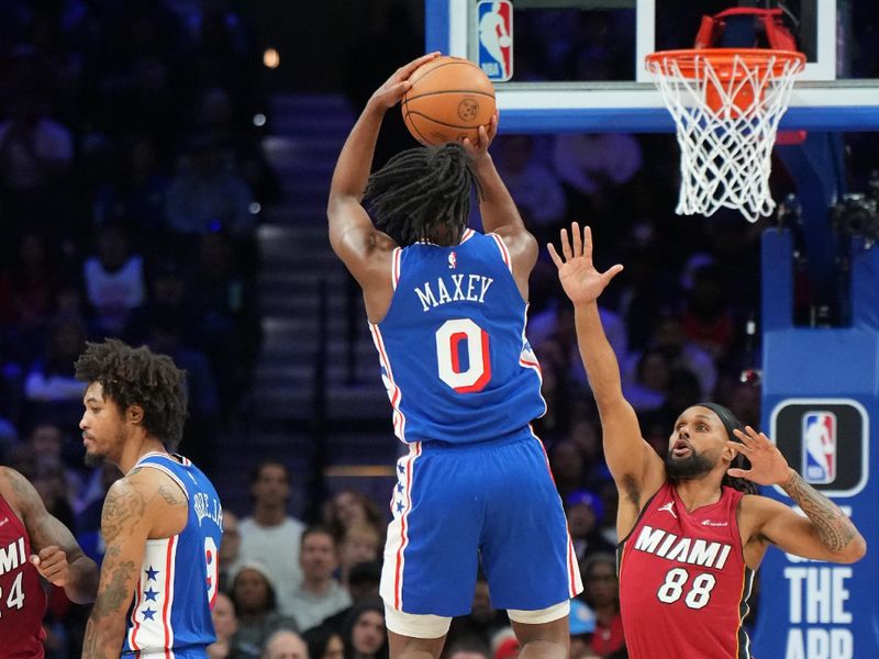 PHILADELPHIA, PA - MARCH 18: Tyrese Maxey #0 of the Philadelphia 76ers shoots the ball during the game against the Miami Heat on March 18, 2024 at the Wells Fargo Center in Philadelphia, Pennsylvania NOTE TO USER: User expressly acknowledges and agrees that, by downloading and/or using this Photograph, user is consenting to the terms and conditions of the Getty Images License Agreement. Mandatory Copyright Notice: Copyright 2024 NBAE (Photo by Jesse D. Garrabrant/NBAE via Getty Images)