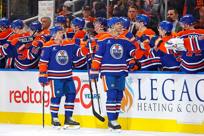 Jan 3, 2025; Edmonton, Alberta, CAN; The Edmonton Oilers celebrate a goal scored by defensemen Darnell Nurse (25) during the second period against the Anaheim Ducks at Rogers Place. Mandatory Credit: Perry Nelson-Imagn Images