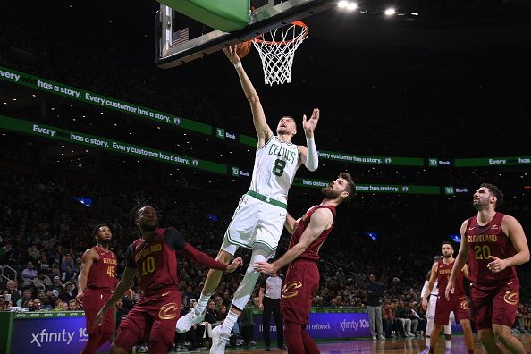 BOSTON, MA - DECEMBER 14: Kristaps Porzingis #8 of the Boston Celtics shoots the ball during the game against the Cleveland Cavaliers on December 14, 2023 at the TD Garden in Boston, Massachusetts. NOTE TO USER: User expressly acknowledges and agrees that, by downloading and or using this photograph, User is consenting to the terms and conditions of the Getty Images License Agreement. Mandatory Copyright Notice: Copyright 2023 NBAE  (Photo by Brian Babineau/NBAE via Getty Images)