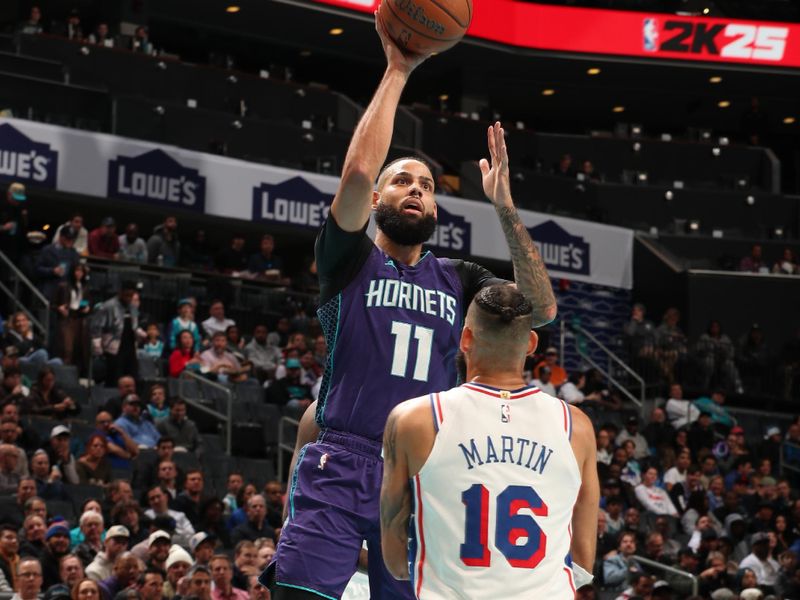 CHARLOTTE, NC - DECEMBER 3: Cody Martin #11 of the Charlotte Hornets shoots the ball during the game against the Philadelphia 76ers during an NBA Emirates Cup game on December 3, 2024 at Spectrum Center in Charlotte, North Carolina. NOTE TO USER: User expressly acknowledges and agrees that, by downloading and or using this photograph, User is consenting to the terms and conditions of the Getty Images License Agreement. Mandatory Copyright Notice: Copyright 2024 NBAE (Photo by Kent Smith/NBAE via Getty Images)