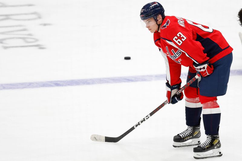 Sep 28, 2023; Washington, District of Columbia, USA; Washington Capitals left wing Ivan Miroshnichenko (63) stands on the ice during warmup prior to the game against the Detroit Red Wings at Capital One Arena. Mandatory Credit: Geoff Burke-USA TODAY Sports