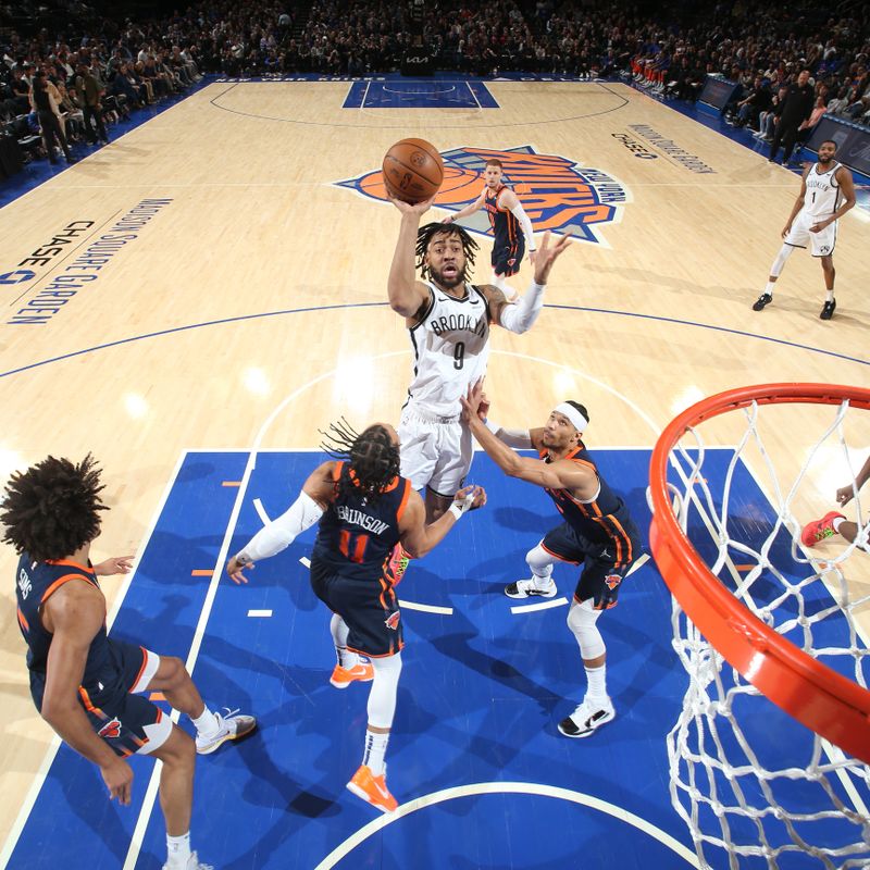 NEW YORK, NY - APRIL 12: Trendon Watford #9 of the Brooklyn Nets drives to the basket during the game against the New York Knicks on April 12, 2024 at Madison Square Garden in New York City, New York.  NOTE TO USER: User expressly acknowledges and agrees that, by downloading and or using this photograph, User is consenting to the terms and conditions of the Getty Images License Agreement. Mandatory Copyright Notice: Copyright 2024 NBAE  (Photo by Nathaniel S. Butler/NBAE via Getty Images)