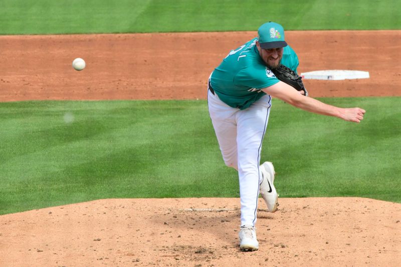 Feb 20, 2026; Peoria, Arizona, USA; Seattle Mariners pitcher Cooper Criswell (18) throws in the third inning against the San Diego Padres during a Spring Training game at Peoria Sports Complex. Mandatory Credit: Matt Kartozian-Imagn Images