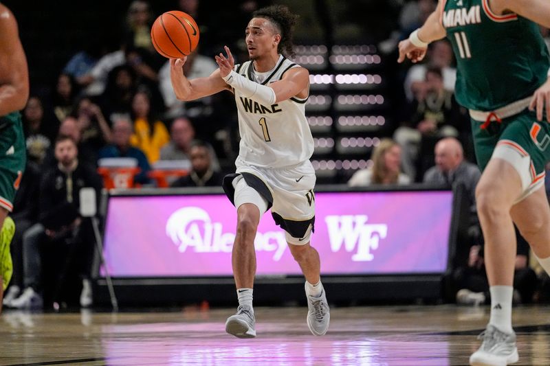 Jan 7, 2026; Winston-Salem, North Carolina, USA; Wake Forest Demon Deacons guard Nate Calmese (1) passes the ball during the first half against the Miami (FL) Hurricanes at Lawrence Joel Veterans Memorial Coliseum. Mandatory Credit: Jim Dedmon-Imagn Images