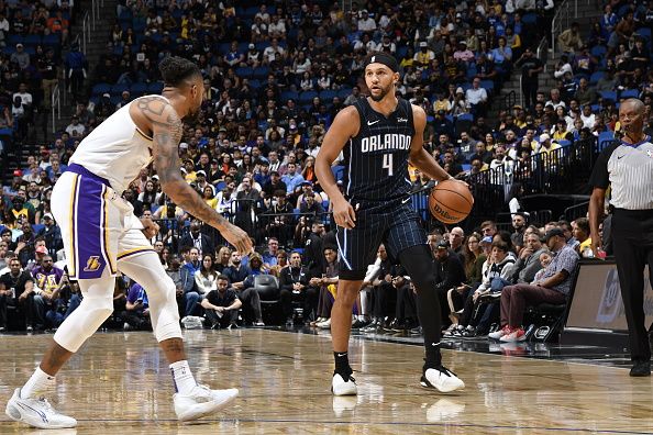 ORLANDO, FL - NOVEMBER 4: Jalen Suggs #4 of the Orlando Magic dribbles the ball during the game against the Los Angeles Lakers on November 4, 2023 at Amway Center in Orlando, Florida. NOTE TO USER: User expressly acknowledges and agrees that, by downloading and or using this photograph, User is consenting to the terms and conditions of the Getty Images License Agreement. Mandatory Copyright Notice: Copyright 2023 NBAE (Photo by Fernando Medina/NBAE via Getty Images)