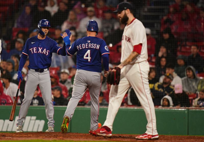 May 6, 2025; Boston, Massachusetts, USA; Texas Rangers designated hitter Joc Pederson (4) scores against the Boston Red Sox in the fourth inning at Fenway Park. Mandatory Credit: David Butler II-Imagn Images