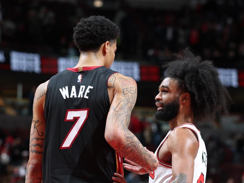 CHICAGO, IL - FEBRUARY 4:  Kel'el Ware #7 of the Miami Heat and Coby White #0 of the Chicago Bulls talk after the game between the Miami Heat and the Chicago Bulls on February 4 2025 at United Center in Chicago, Illinois. NOTE TO USER: User expressly acknowledges and agrees that, by downloading and or using this photograph, User is consenting to the terms and conditions of the Getty Images License Agreement. Mandatory Copyright Notice: Copyright 2025 NBAE (Photo by Jeff Haynes/NBAE via Getty Images)