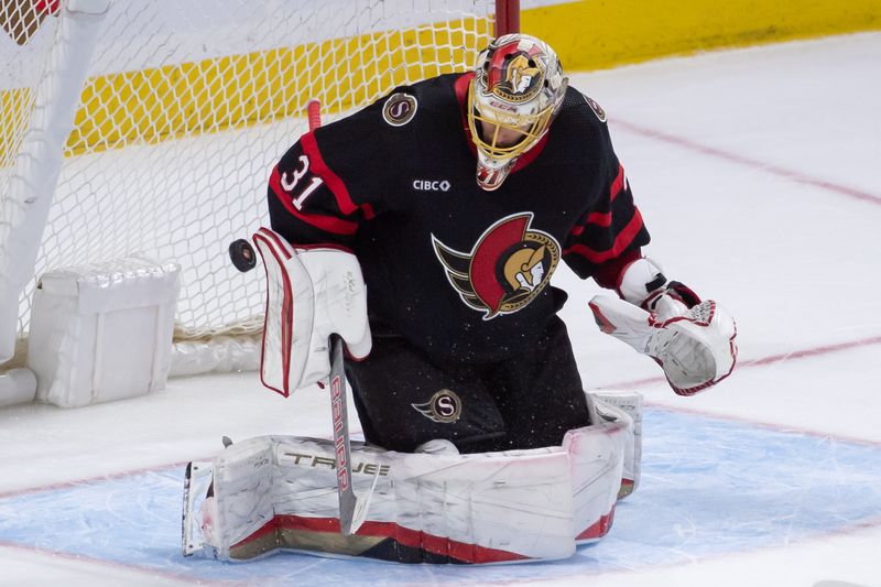 Feb 24, 2024; Ottawa, Ontario, CAN; Ottawa Senators goalie Anton Forsberg (31) makes a save in overtime against the Vegas Golden Knights at the Canadian Tire Centre. Mandatory Credit: Marc DesRosiers-USA TODAY Sports