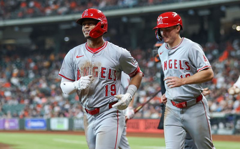 May 22, 2024; Houston, Texas, USA; Los Angeles Angels second baseman Kyren Paris (19) jogs to the dugout after hitting a home run during the fifth inning against the Houston Astros at Minute Maid Park. Mandatory Credit: Troy Taormina-USA TODAY Sports