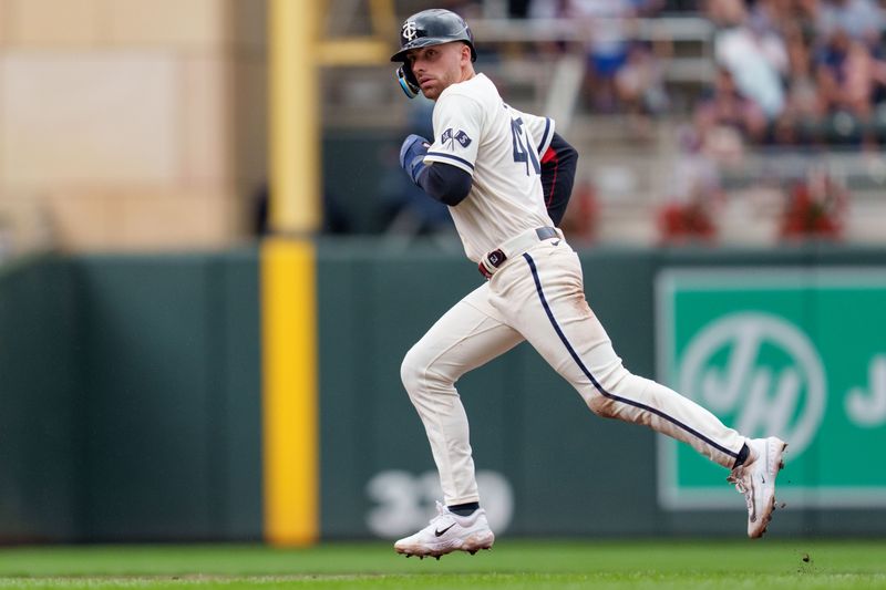 Sep 24, 2023; Minneapolis, Minnesota, USA; Minnesota Twins second baseman Edouard Julien (47) runs to third base in the fifth inning against the Los Angeles Angels at Target Field. Mandatory Credit: Matt Blewett-USA TODAY Sports