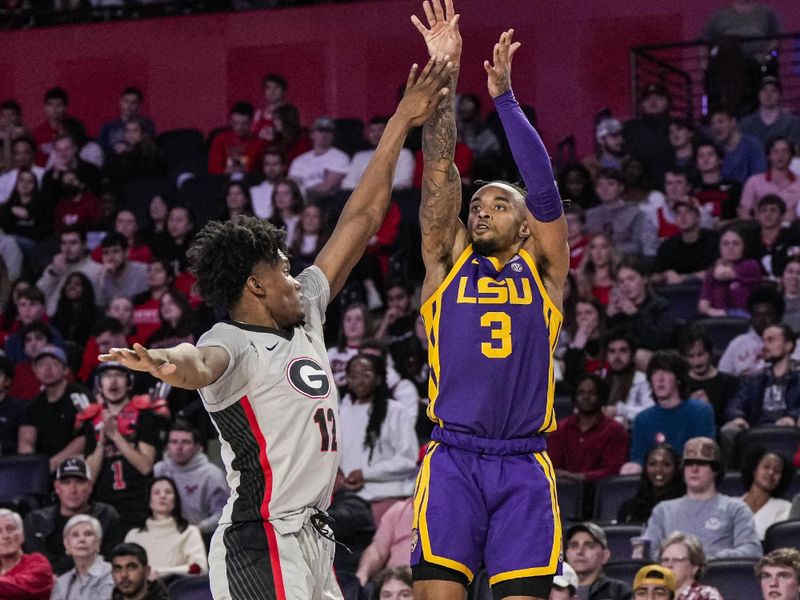 Feb 14, 2023; Athens, Georgia, USA; LSU Tigers guard Justice Hill (3) shoots over Georgia Bulldogs forward Matthew-Alexander Moncrieffe (12) during the first half at Stegeman Coliseum. Mandatory Credit: Dale Zanine-USA TODAY Sports