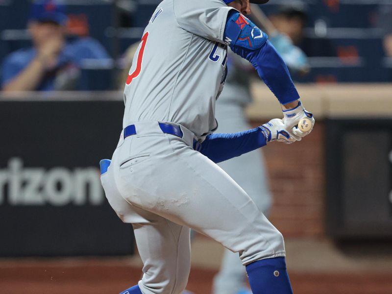 Apr 29, 2024; New York City, New York, USA; Chicago Cubs right fielder Mike Tauchman (40) is hit by a pitch during the seventh inning against the New York Mets at Citi Field. Mandatory Credit: Vincent Carchietta-USA TODAY Sports