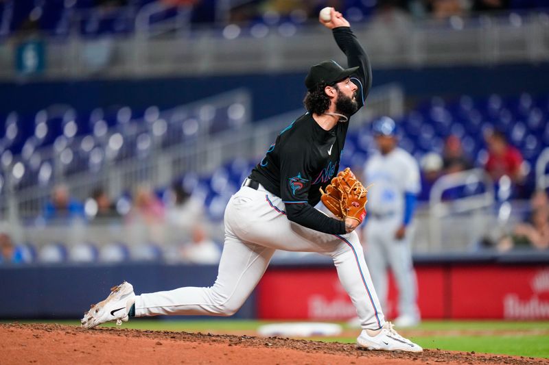 Jun 7, 2023; Miami, Florida, USA; Miami Marlins relief pitcher Andrew Nardi (43) throws a pitch against the Kansas City Royals during the eighth inning at loanDepot Park. Mandatory Credit: Rich Storry-USA TODAY Sports