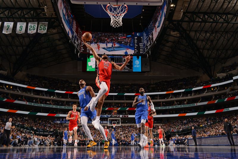 DALLAS, TX - JANUARY 13: Jeremiah Robinson-Earl #50 of the Dallas Mavericks dunks the ball during the game against the Dallas Mavericks on January 13, 2024 at the American Airlines Center in Dallas, Texas. NOTE TO USER: User expressly acknowledges and agrees that, by downloading and or using this photograph, User is consenting to the terms and conditions of the Getty Images License Agreement. Mandatory Copyright Notice: Copyright 2024 NBAE (Photo by Glenn James/NBAE via Getty Images)