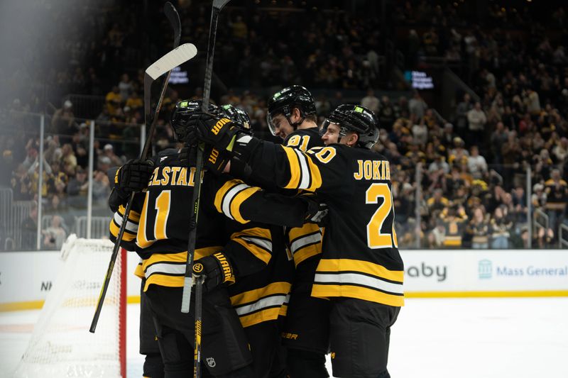 Jan 11, 2026; Boston, Massachusetts, USA; Boston Bruins right-winger Viktor Arvidsson (71) scores during the first period of the game against the Pittsburgh Penguins at TD Garden. Mandatory Credit: Natalie Reid-Imagn Images