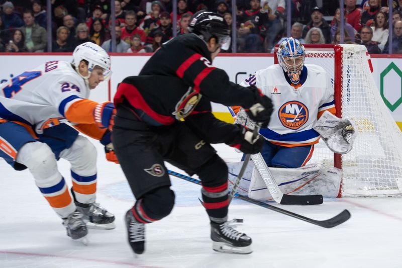 Dec 8, 2024; Ottawa, Ontario, CAN; Ottawa Senators center Nick Cousins (21) moves the puck in front of New York Islanders goalie Ilya Sorokin (30) in the first period at the Canadian Tire Centre. Mandatory Credit: Marc DesRosiers-Imagn Images