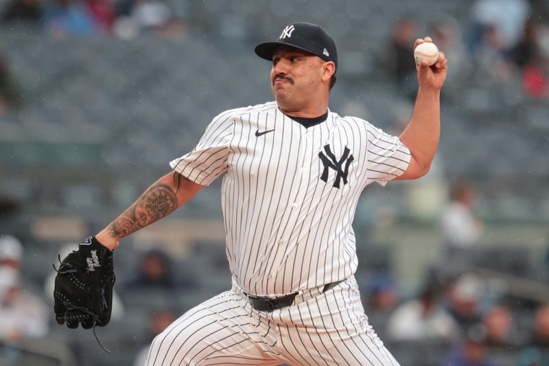 May 5, 2024; Bronx, New York, USA; New York Yankees starting pitcher Nestor Cortes (65) delivers a pitch during the first inning against the Detroit Tigers at Yankee Stadium. Mandatory Credit: Vincent Carchietta-USA TODAY Sports