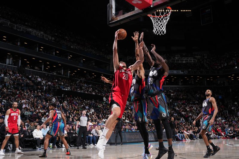 BROOKLYN, NY - JANUARY 27: Alperen Sengun #28 of the Houston Rockets drives to the basket during the game against the Brooklyn Nets on January 27, 2024 at Barclays Center in Brooklyn, New York. NOTE TO USER: User expressly acknowledges and agrees that, by downloading and or using this Photograph, user is consenting to the terms and conditions of the Getty Images License Agreement. Mandatory Copyright Notice: Copyright 2024 NBAE (Photo by Jesse D. Garrabrant/NBAE via Getty Images)