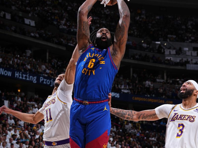 DENVER, CO - APRIL 20: DeAndre Jordan #6 of the Denver Nuggets dunks the ball during the game against the Los Angeles Lakers during Round 1 Game 1 of the 2024 NBA Playoffs on April 20, 2024 at the Ball Arena in Denver, Colorado. NOTE TO USER: User expressly acknowledges and agrees that, by downloading and/or using this Photograph, user is consenting to the terms and conditions of the Getty Images License Agreement. Mandatory Copyright Notice: Copyright 2024 NBAE (Photo by Garrett Ellwood/NBAE via Getty Images)