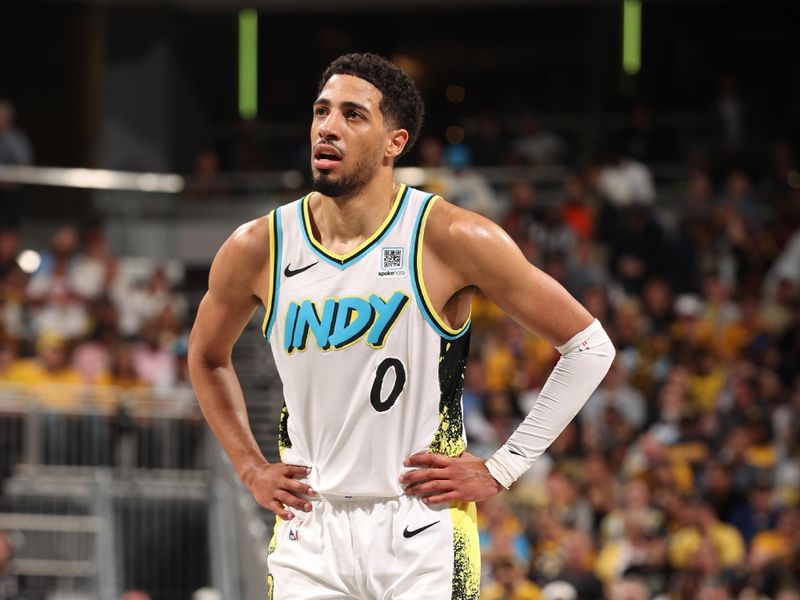 INDIANAPOLIS, IN - MAY 11:   Tyrese Haliburton #0 of the Indiana Pacers looks on during the game against the Cleveland Cavaliers during Round 2 Game 3 of the 2025 NBA Playoffs  on May 11, 2025 at Gainbridge Fieldhouse in Indianapolis, Indiana. NOTE TO USER: User expressly acknowledges and agrees that, by downloading and or using this Photograph, user is consenting to the terms and conditions of the Getty Images License Agreement. Mandatory Copyright Notice: Copyright 2025 NBAE (Photo by Joe MurphyNBAE via Getty Images)