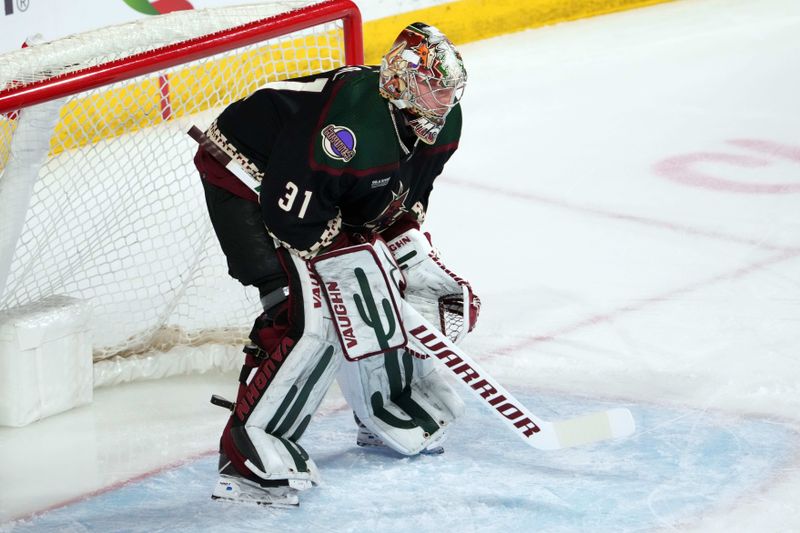 Feb 19, 2024; Tempe, Arizona, USA; Arizona Coyotes goalie Matt Villalta (31) looks on against the Edmonton Oilers during the first period at Mullett Arena. Mandatory Credit: Joe Camporeale-USA TODAY Sports