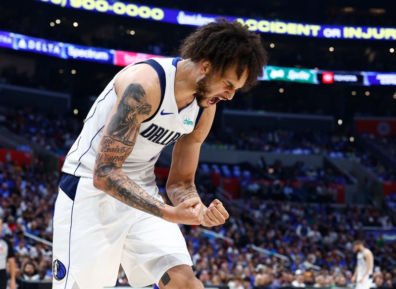 LOS ANGELES, CALIFORNIA - APRIL 21:  Dereck Lively II #2 of the Dallas Mavericks reacts against the LA Clippers in the second half during game one of the Western Conference First Round Playoffs at Crypto.com Arena on April 21, 2024 in Los Angeles, California.   NOTE TO USER: User expressly acknowledges and agrees that, by downloading and/or using this photograph, user is consenting to the terms and conditions of the Getty Images License Agreement.  (Photo by Ronald Martinez/Getty Images)