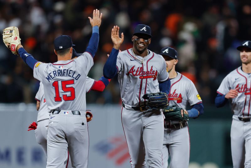 Aug 12, 2024; San Francisco, California, USA; Atlanta Braves outfielder Jorge Soler (2) celebrates with teammates after the game against the San Francisco Giants at Oracle Park. Mandatory Credit: Sergio Estrada-USA TODAY Sports