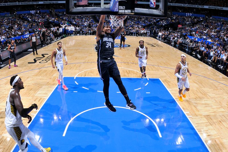 ORLANDO, FL - OCTOBER 28: Wendell Carter Jr. #34 of the Orlando Magic dunks the ball during the game against the Indiana Pacers on October 28, 2024 at Kia Center in Orlando, Florida. NOTE TO USER: User expressly acknowledges and agrees that, by downloading and or using this photograph, User is consenting to the terms and conditions of the Getty Images License Agreement. Mandatory Copyright Notice: Copyright 2024 NBAE (Photo by Fernando Medina/NBAE via Getty Images)