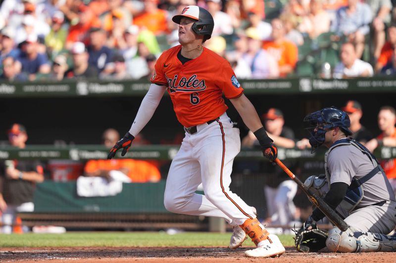 Jul 13, 2024; Baltimore, Maryland, USA; Baltimore Orioles first baseman Ryan Mountcastle (6) drives in a run during the fourth inning against the New York Yankees at Oriole Park at Camden Yards. Mandatory Credit: Mitch Stringer-USA TODAY Sports