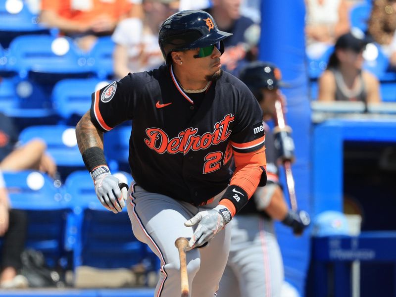 Mar 14, 2026; Dunedin, Florida, USA;  Detroit Tigers shortstop Javier Baez (28) singles during the second inning against the Toronto Blue Jays at TD Ballpark. Mandatory Credit: Kim Klement Neitzel-Imagn Images