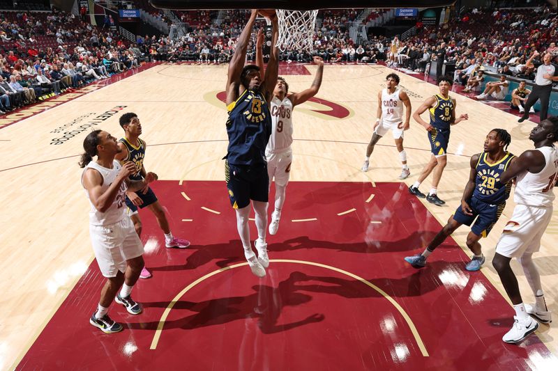 Cleveland, OH - OCTOBER 10: James Wiseman #13 of the Indiana Pacers goes up for the rebound during the game against the Cleveland Cavaliers during a NBA pre season game on October 10, 2024 at Rocket Mortgage Fieldhouse in Cleveland, Ohio. NOTE TO USER: User expressly acknowledges and agrees that, by downloading and or using this photograph, User is consenting to the terms and conditions of the Getty Images License Agreement. Mandatory Copyright Notice: Copyright 2024 NBAE (Photo by Jeff Haynes/NBAE via Getty Images)