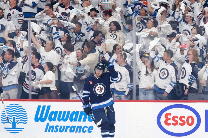 Apr 30, 2024; Winnipeg, Manitoba, CAN; Winnipeg Jets fans celebrate the first period goal by Winnipeg Jets left wing Kyle Connor (81) against the Colorado Avalanche in game five of the first round of the 2024 Stanley Cup Playoffs at Canada Life Centre. Mandatory Credit: James Carey Lauder-USA TODAY Sports