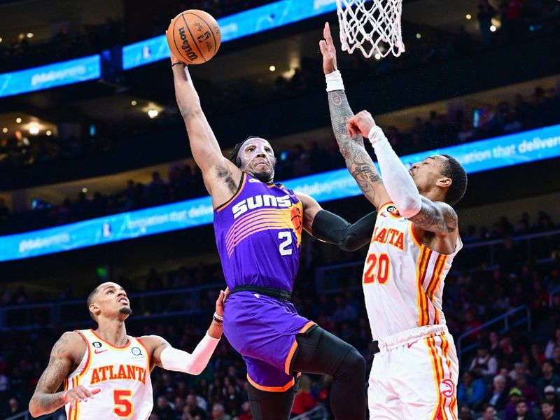 ATLANTA, GA - FEBUARY 9: Josh Okogie #2 of the Phoenix Suns goes to the basket during the game  on Febuary 9, 2023 at State Farm Arena in Atlanta, Georgia.  NOTE TO USER: User expressly acknowledges and agrees that, by downloading and/or using this Photograph, user is consenting to the terms and conditions of the Getty Images License Agreement. Mandatory Copyright Notice: Copyright 2023 NBAE (Photo by Adam Hagy/NBAE via Getty Images)