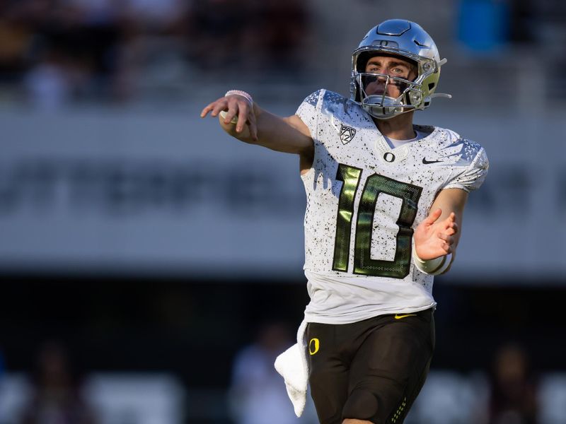 Nov 18, 2023; Tempe, Arizona, USA; Oregon Ducks quarterback Bo Nix (10) against the Arizona State Sun Devils at Mountain America Stadium. Mandatory Credit: Mark J. Rebilas-USA TODAY Sports