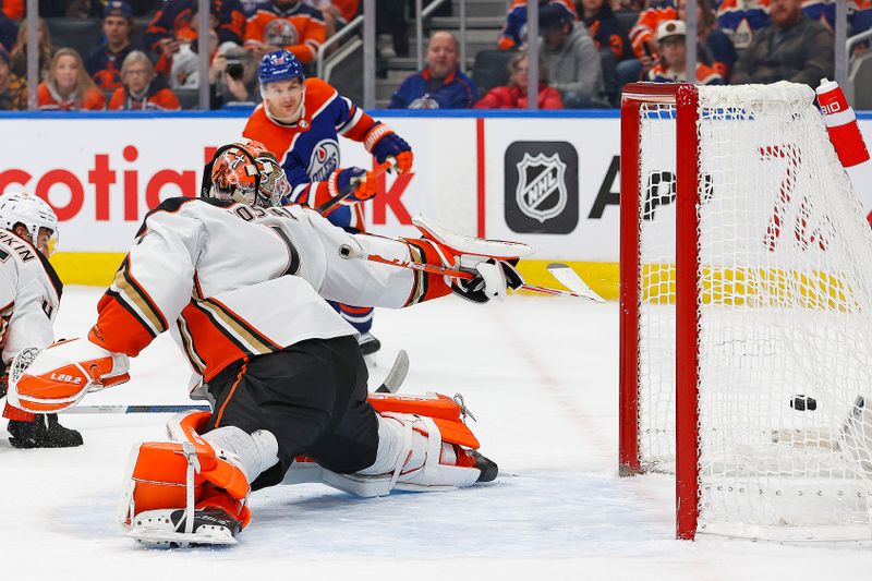 Nov 26, 2023; Edmonton, Alberta, CAN; Edmonton Oilers forward Zach Hyman (18) scores a goal during the first period against Anaheim Ducks goaltender Lucas Dostal (1) at Rogers Place. Mandatory Credit: Perry Nelson-USA TODAY Sports