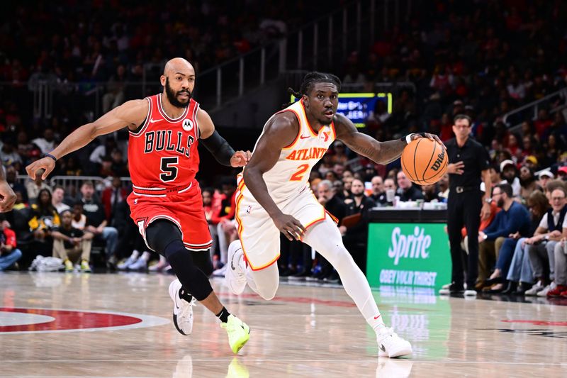 ATLANTA, GA - NOVEMBER 9: Keaton Wallace #2 of the Atlanta Hawks dribbles the ball during the game against the Chicago Bulls on November 9, 2024 at State Farm Arena in Atlanta, Georgia.  NOTE TO USER: User expressly acknowledges and agrees that, by downloading and/or using this Photograph, user is consenting to the terms and conditions of the Getty Images License Agreement. Mandatory Copyright Notice: Copyright 2024 NBAE (Photo by Adam Hagy/NBAE via Getty Images)