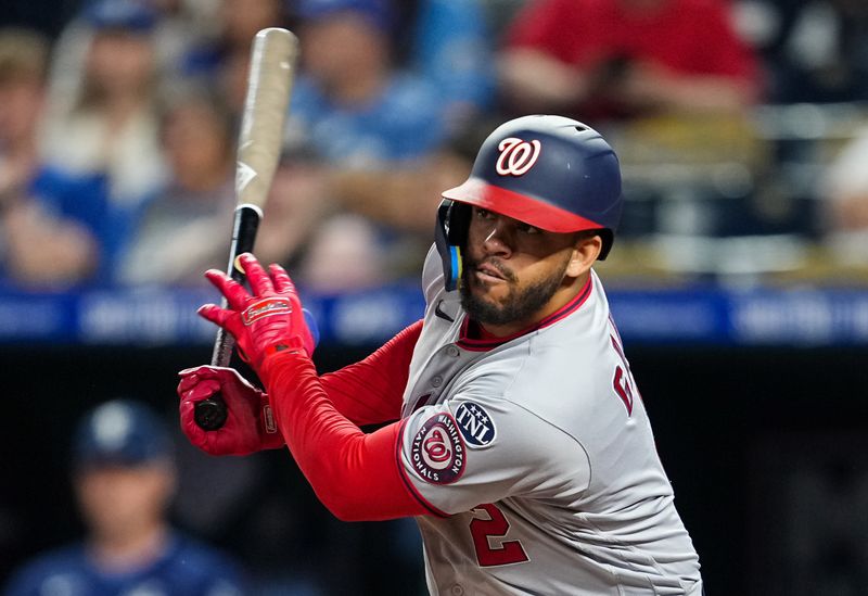 May 26, 2023; Kansas City, Missouri, USA; Washington Nationals second baseman Luis Garcia (2) hits a single during the eighth inning against the Kansas City Royals at Kauffman Stadium. Mandatory Credit: Jay Biggerstaff-USA TODAY Sports