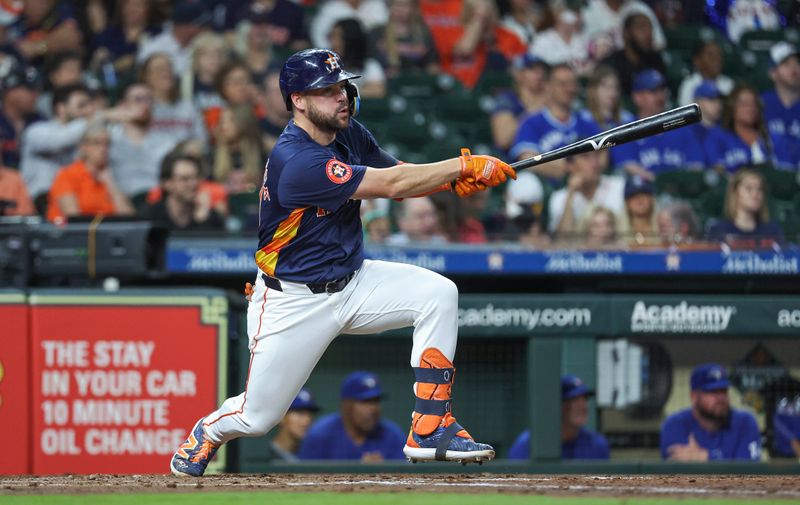 Apr 2, 2024; Houston, Texas, USA; Houston Astros center fielder Chas McCormick (20) hits a single during the third inning against the Toronto Blue Jays at Minute Maid Park. Mandatory Credit: Troy Taormina-USA TODAY Sports