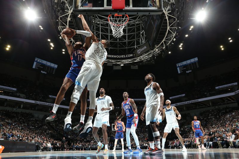 MINNEAPOLIS, MN -  NOVEMBER 27: Issac Jones #17 of the Sacramento Kings drives to the basket during the game against the Minnesota Timberwolves on November 27, 2024 at Target Center in Minneapolis, Minnesota. NOTE TO USER: User expressly acknowledges and agrees that, by downloading and or using this Photograph, user is consenting to the terms and conditions of the Getty Images License Agreement. Mandatory Copyright Notice: Copyright 2024 NBAE (Photo by David Sherman/NBAE via Getty Images)