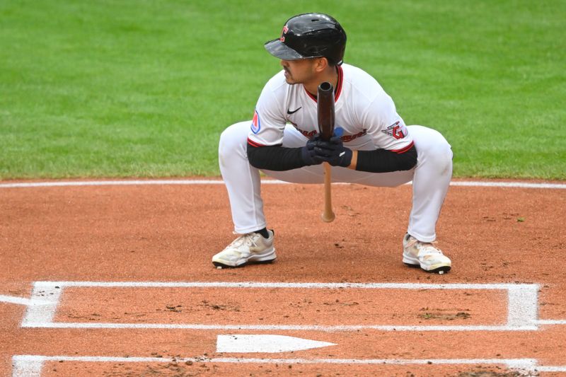 Apr 30, 2025; Cleveland, Ohio, USA; Cleveland Guardians left fielder Steven Kwan (38) stretches before batting in the first inning against the Minnesota Twins at Progressive Field. Mandatory Credit: David Richard-Imagn Images