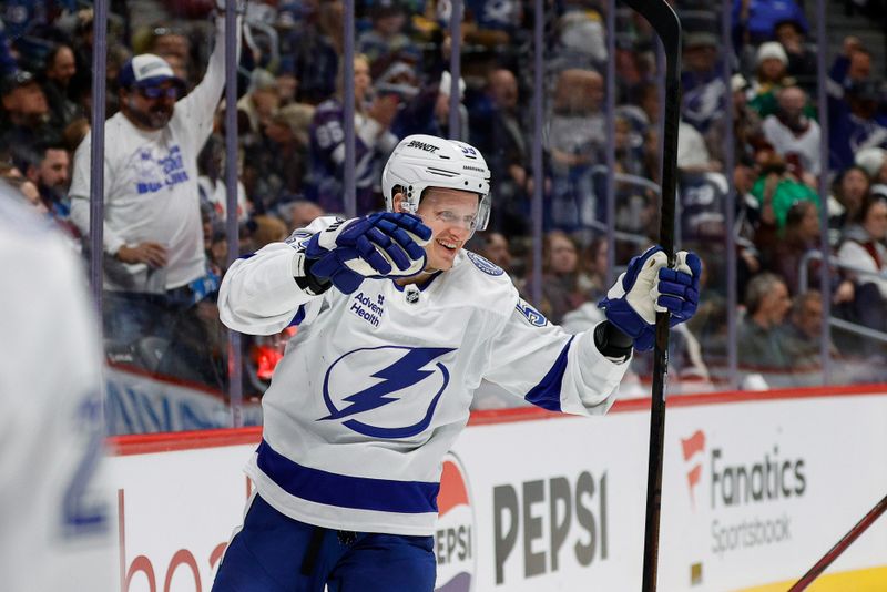 Oct 30, 2024; Denver, Colorado, USA; Tampa Bay Lightning center Jake Guentzel (59) celebrates after his goal in the first period against the Colorado Avalanche at Ball Arena. Mandatory Credit: Isaiah J. Downing-Imagn Images