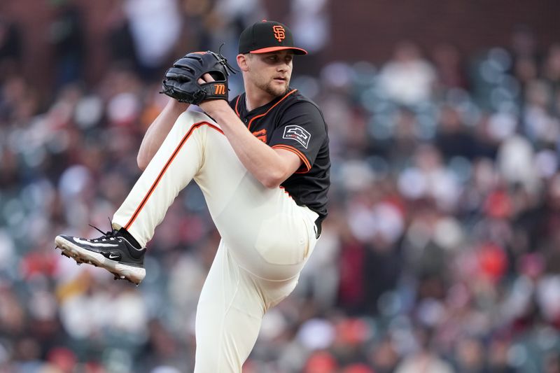 Apr 6, 2024; San Francisco, California, USA; San Francisco Giants starting pitcher Keaton Winn (67) throws a pitch against the San Diego Padres during the first inning at Oracle Park. Mandatory Credit: Darren Yamashita-USA TODAY Sports