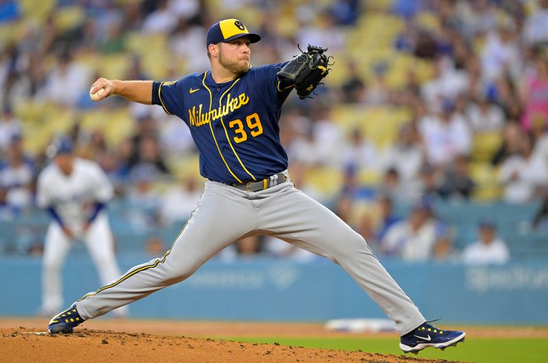 Aug 17, 2023; Los Angeles, California, USA;  Milwaukee Brewers starting pitcher Corbin Burnes (39) throws to the plate in the first inning against the Los Angeles Dodgers at Dodger Stadium. Mandatory Credit: Jayne Kamin-Oncea-USA TODAY Sports