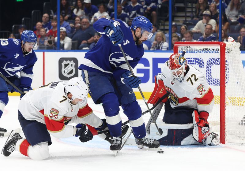 Apr 22, 2025; Tampa, Florida, USA; Florida Panthers defenseman Dmitry Kulikov (7) and goaltender Sergei Bobrovsky (72) defend Tampa Bay Lightning left wing Nick Paul (20) during the  third period in game one of the first round of the 2025 Stanley Cup Playoffs at Amalie Arena. Mandatory Credit: Kim Klement Neitzel-Imagn Images