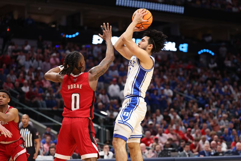 Mar 31, 2024; Dallas, TX, USA; Duke Blue Devils guard Jared McCain (0) shoots against North Carolina State Wolfpack guard DJ Horne (0) in the first half in the finals of the South Regional of the 2024 NCAA Tournament at American Airline Center. Mandatory Credit: Kevin Jairaj-USA TODAY Sports